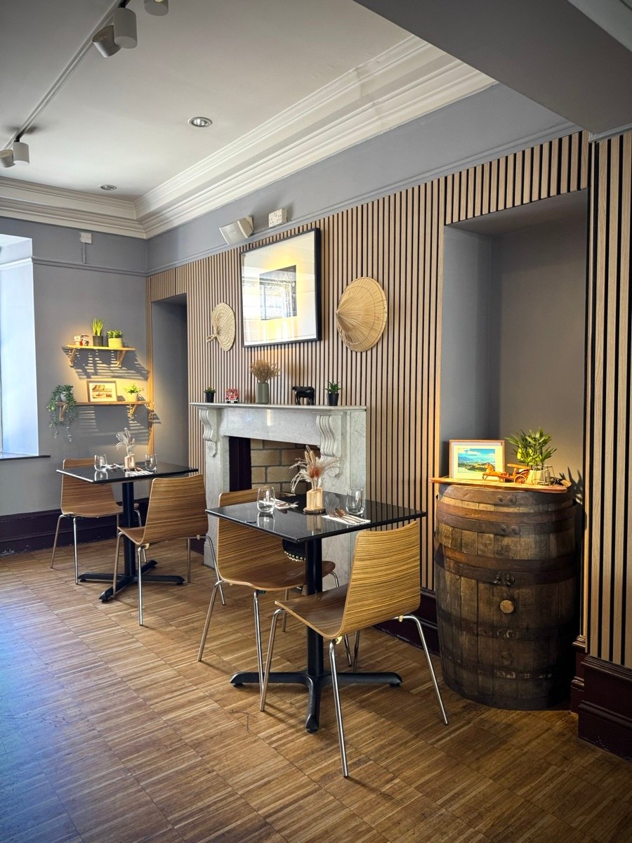 Warm timber and dining tables at Kultura Aberdeen